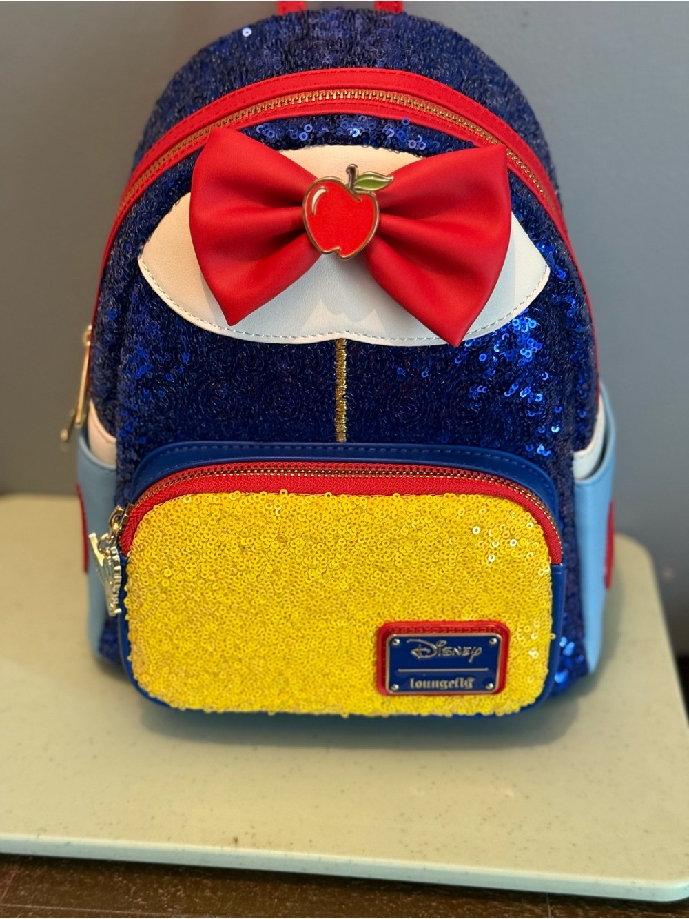Loungefly Snow White Sequin Mini Backpack in Blue, Yellow & Red